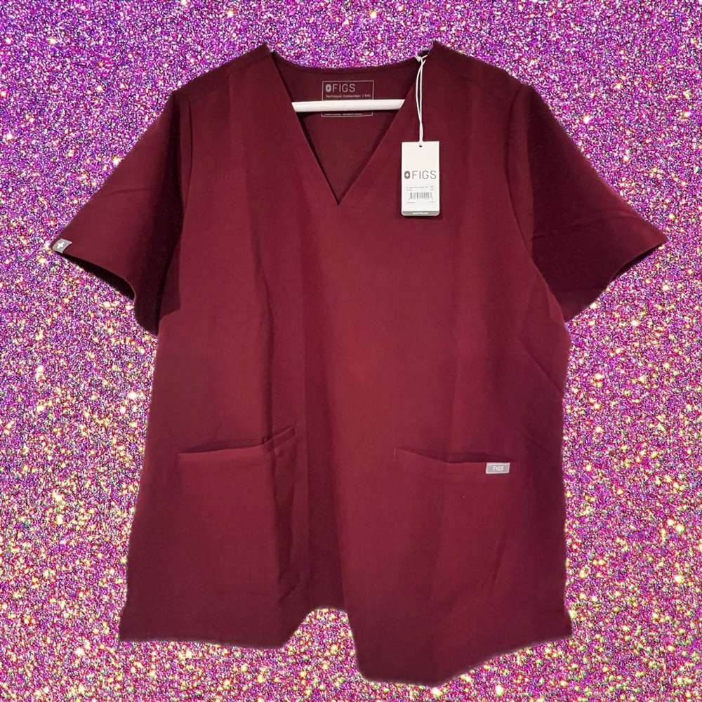 Figs Scrubs SET Top and bottoms ! Top new with Tags bottoms have been worn once.